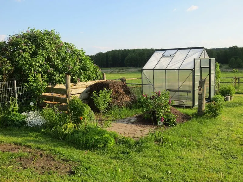 greenhouse next to garden