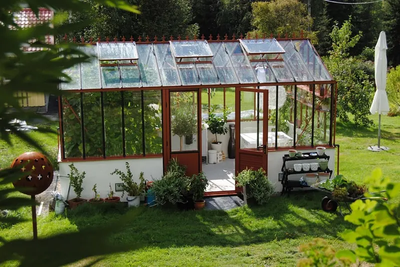 nicely painted and decorated greenhouse