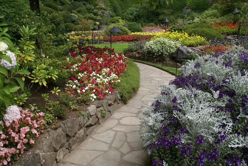 This path from the Butchart Gardens in Victoria, British Columbia uses colored unevenly cut stone to create an interesting design.