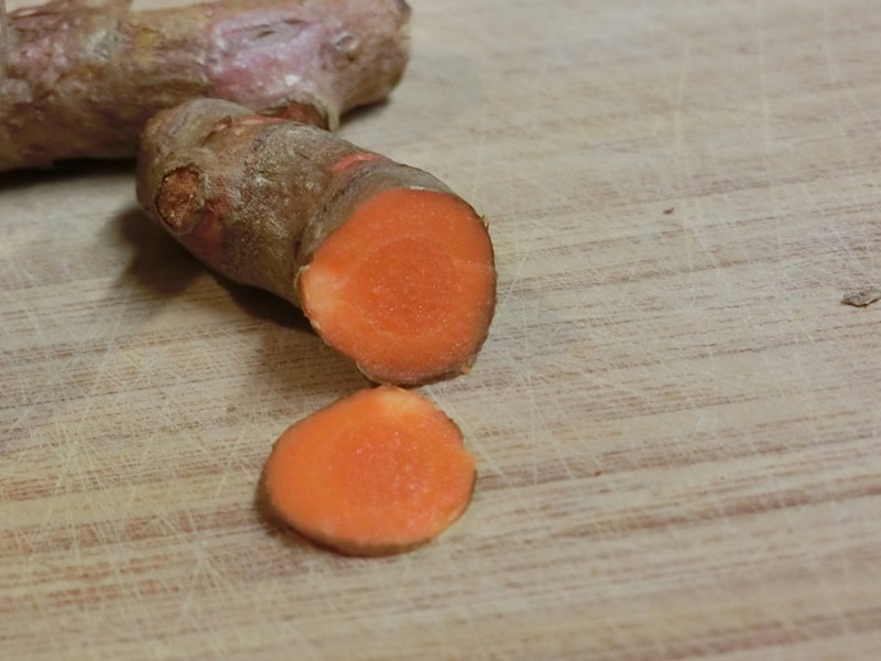 sliced turmeric root