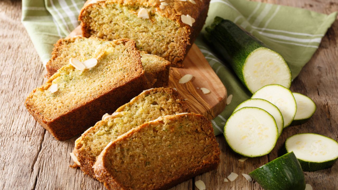 Gluten free zucchini loaf cake closeup on wooden background. Horizontal