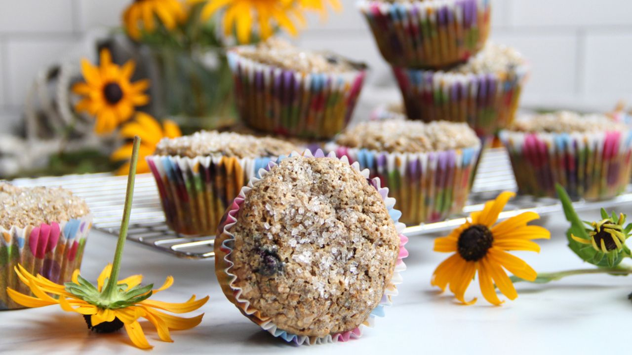 Healthy muffins with tahini, blueberries, carrot, and zucchini