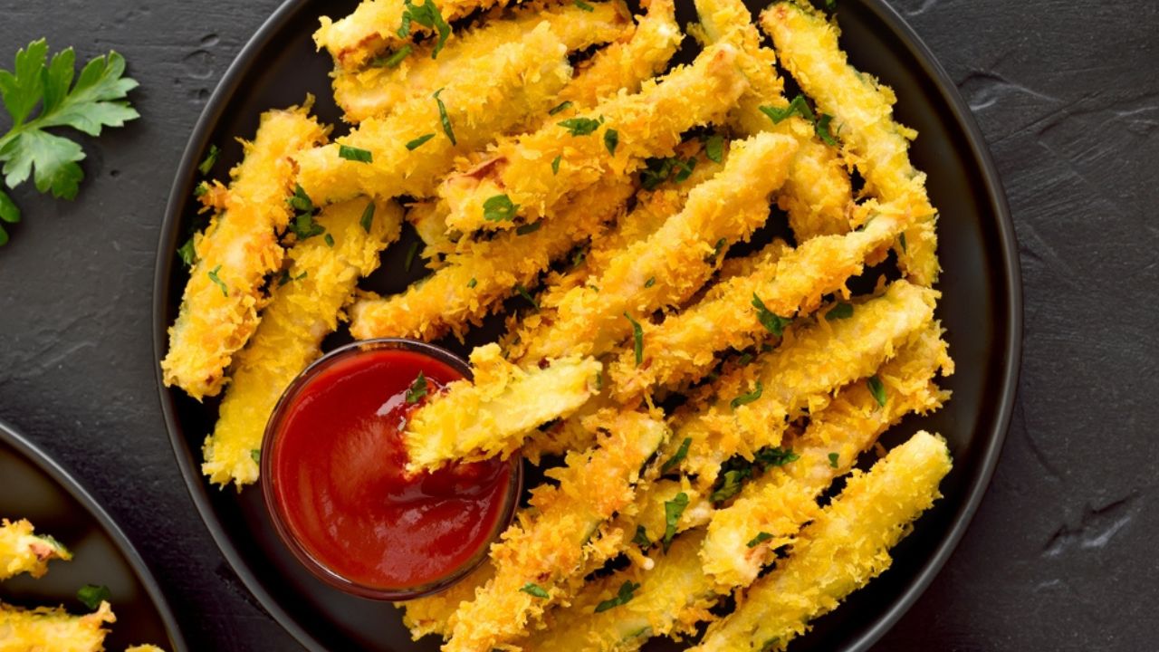 Homemade fried zucchini sticks. Top view, flat lay