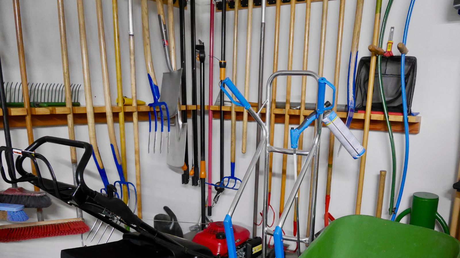 neatly organized tools in a storage shed.