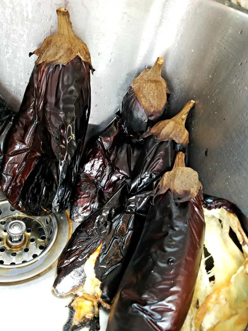 Roasted eggplants chilling in the sink