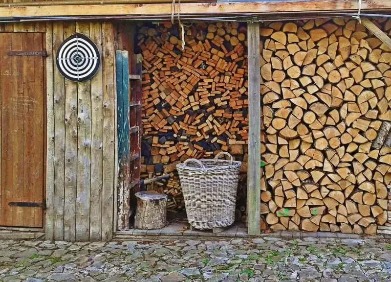 Firewoood shed filled up with wood for the winter