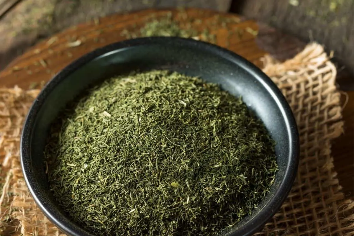 a bowl of dried dill weed