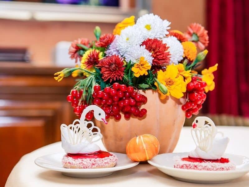 Bright fall bouquet in a pumpkin