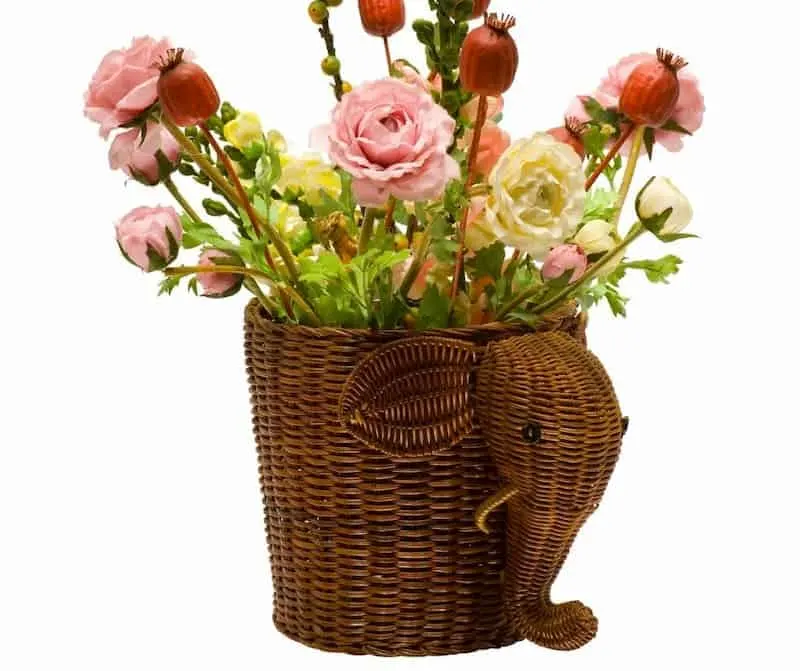 Cute elephant container with flowers