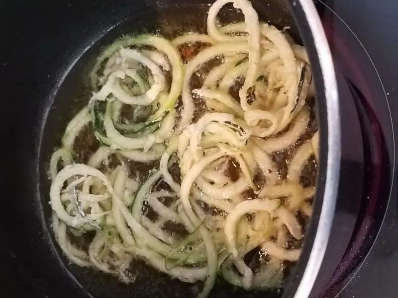 Zucchini noodles in frying pan