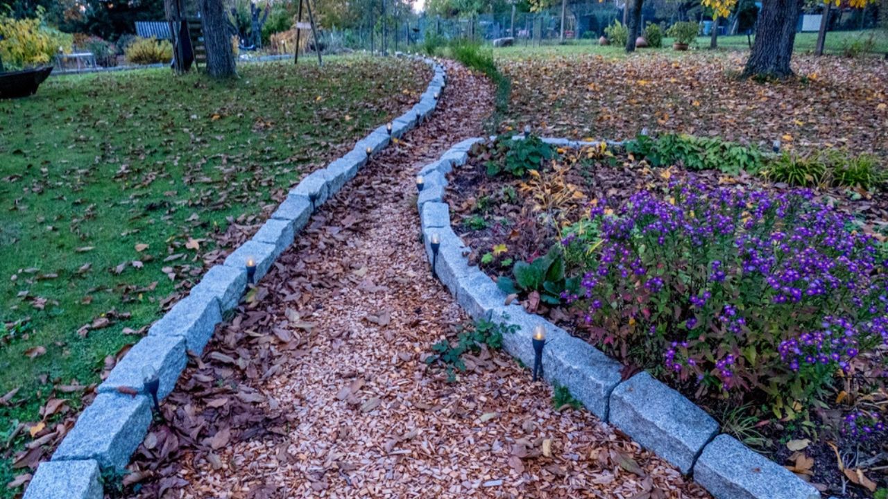 Newly built garden path with bark mulch
