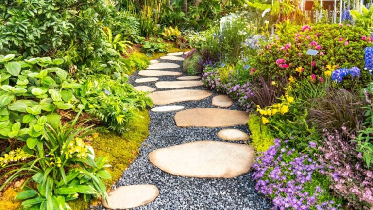 Rock path leading through a flower garden