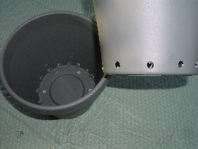 Drain holes in the bottom of the buckets
