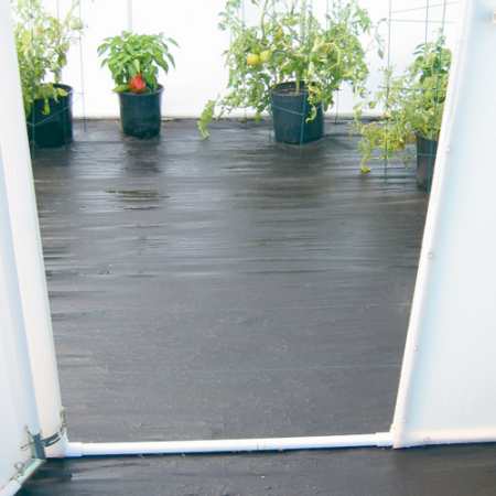 Greenhouse tarp flooring