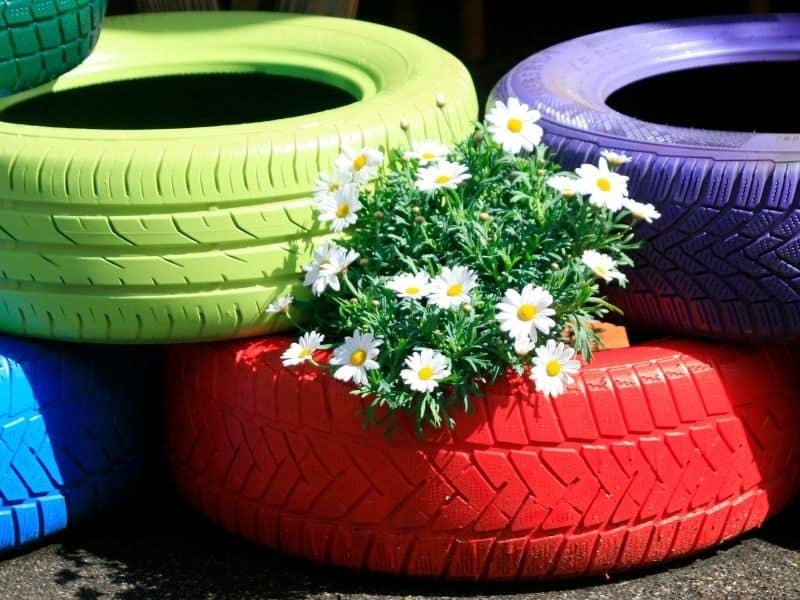 Painted tires used as flower bed edging