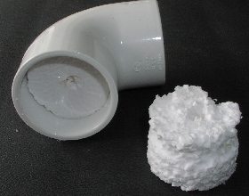 PVC elbow stuffed with Styrofoam