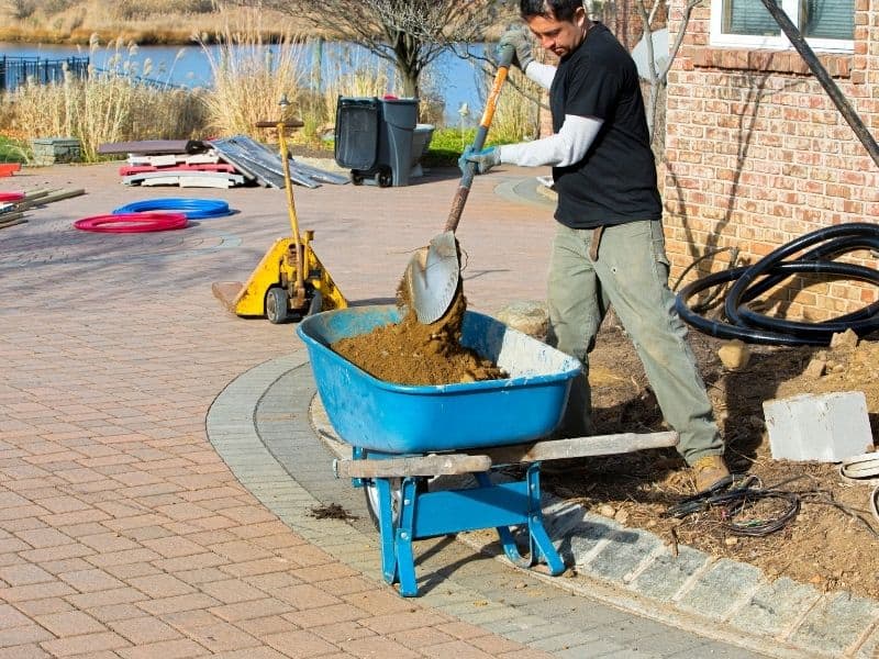 man doing landscaping chores