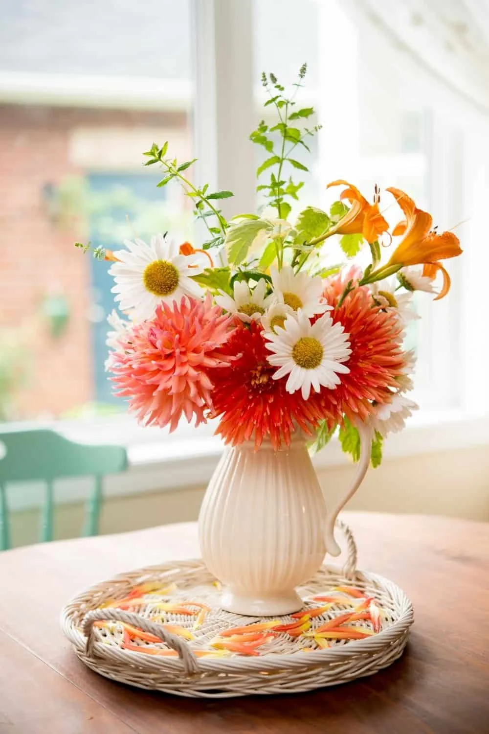 brightly colored bouquet in white vase
