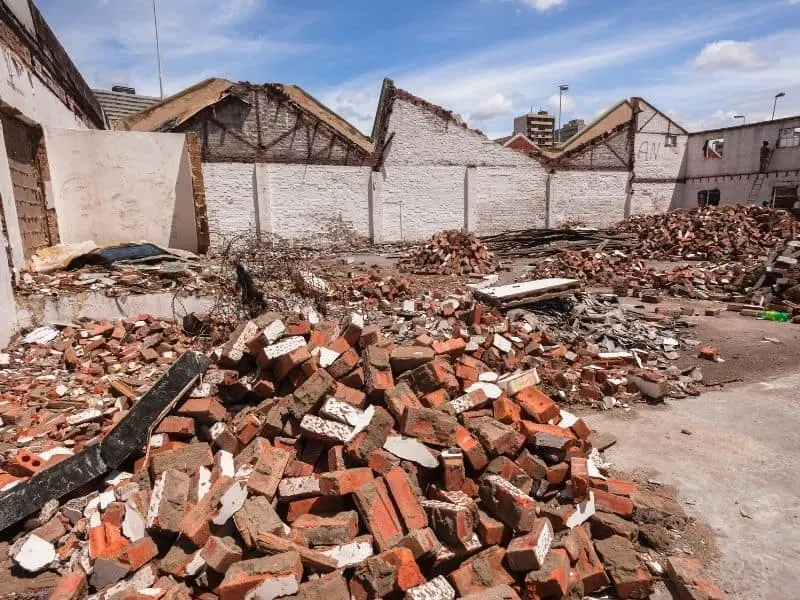 Piles of old bricks on a demolition site