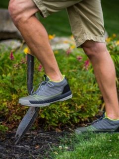 man wearing Kujo shoes diggning in the garden