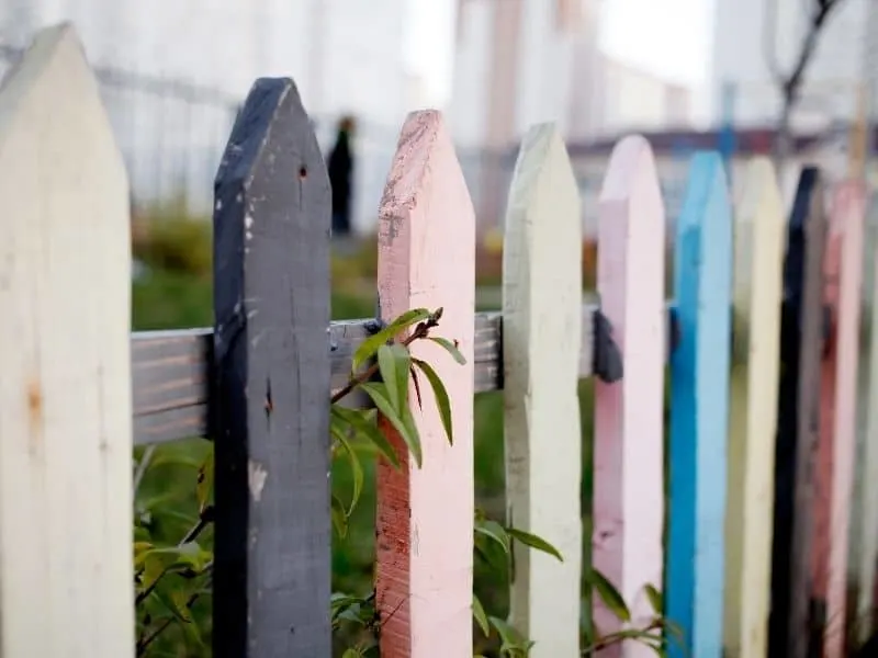 pastel colored recycled wood fence