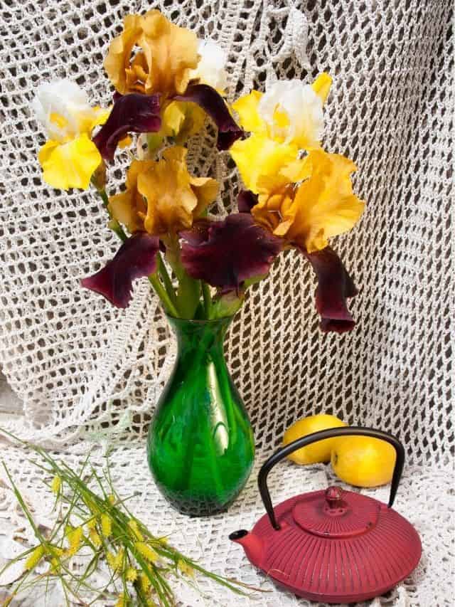 iris bouquet in green vase