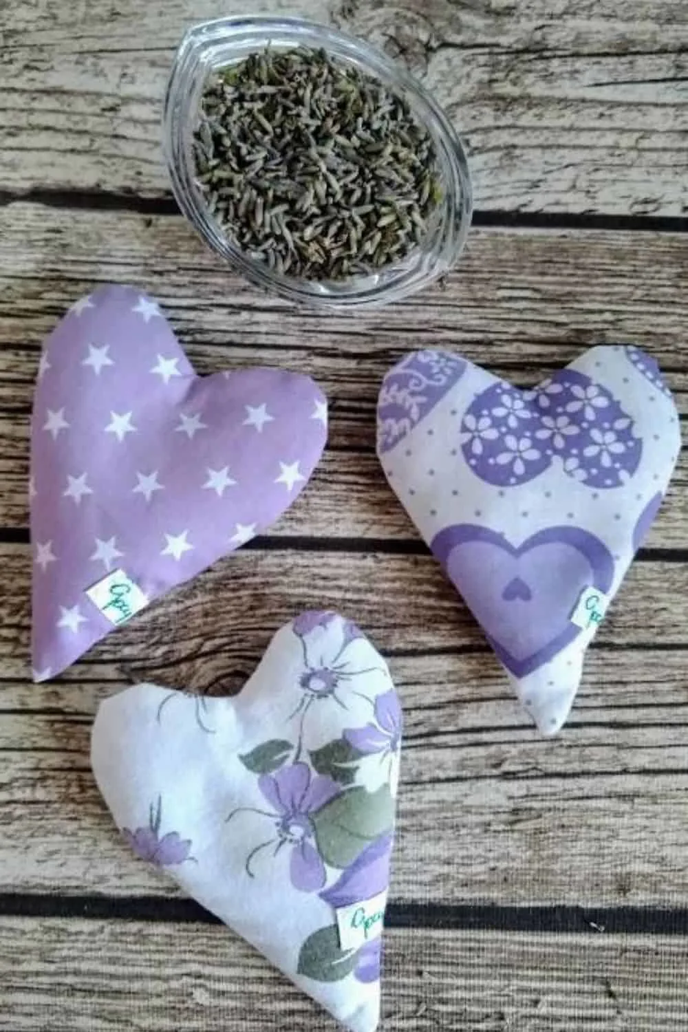 3 heart shaped pouches filled with lavender