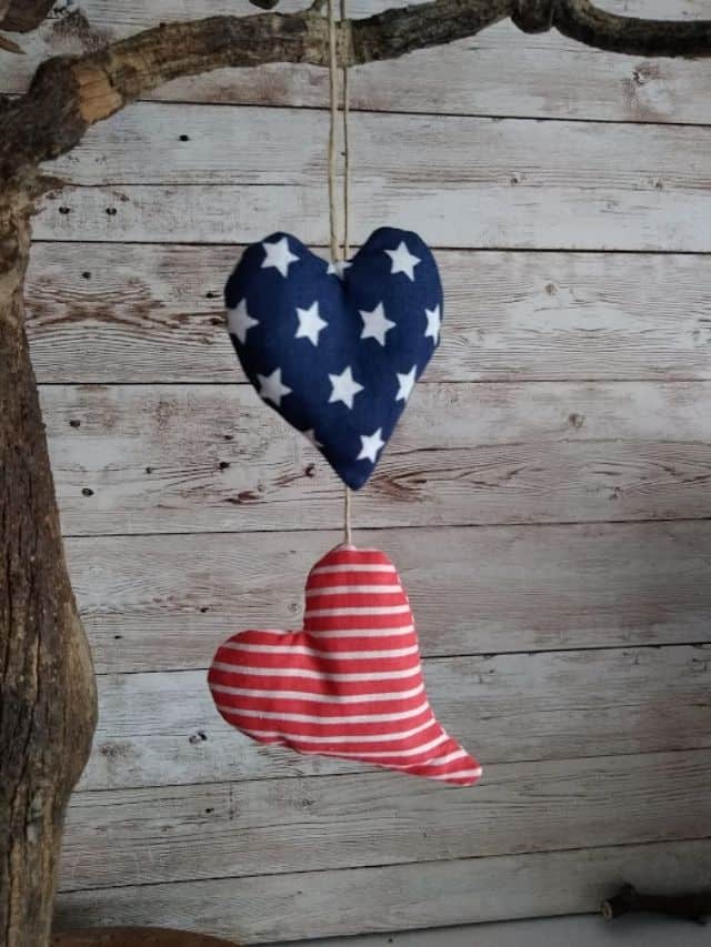 heart shaped sachets hanging on a tree branch