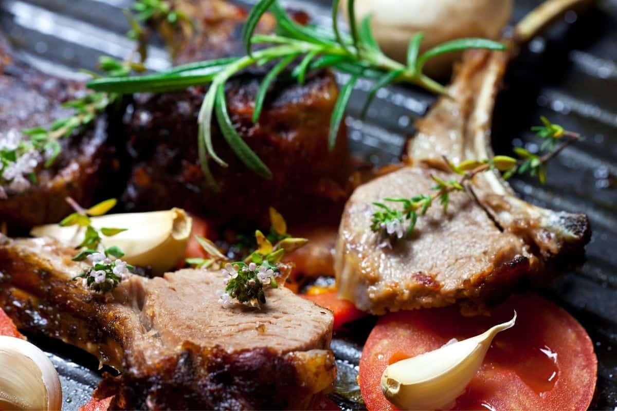 lamb garnished with rosemary flowers