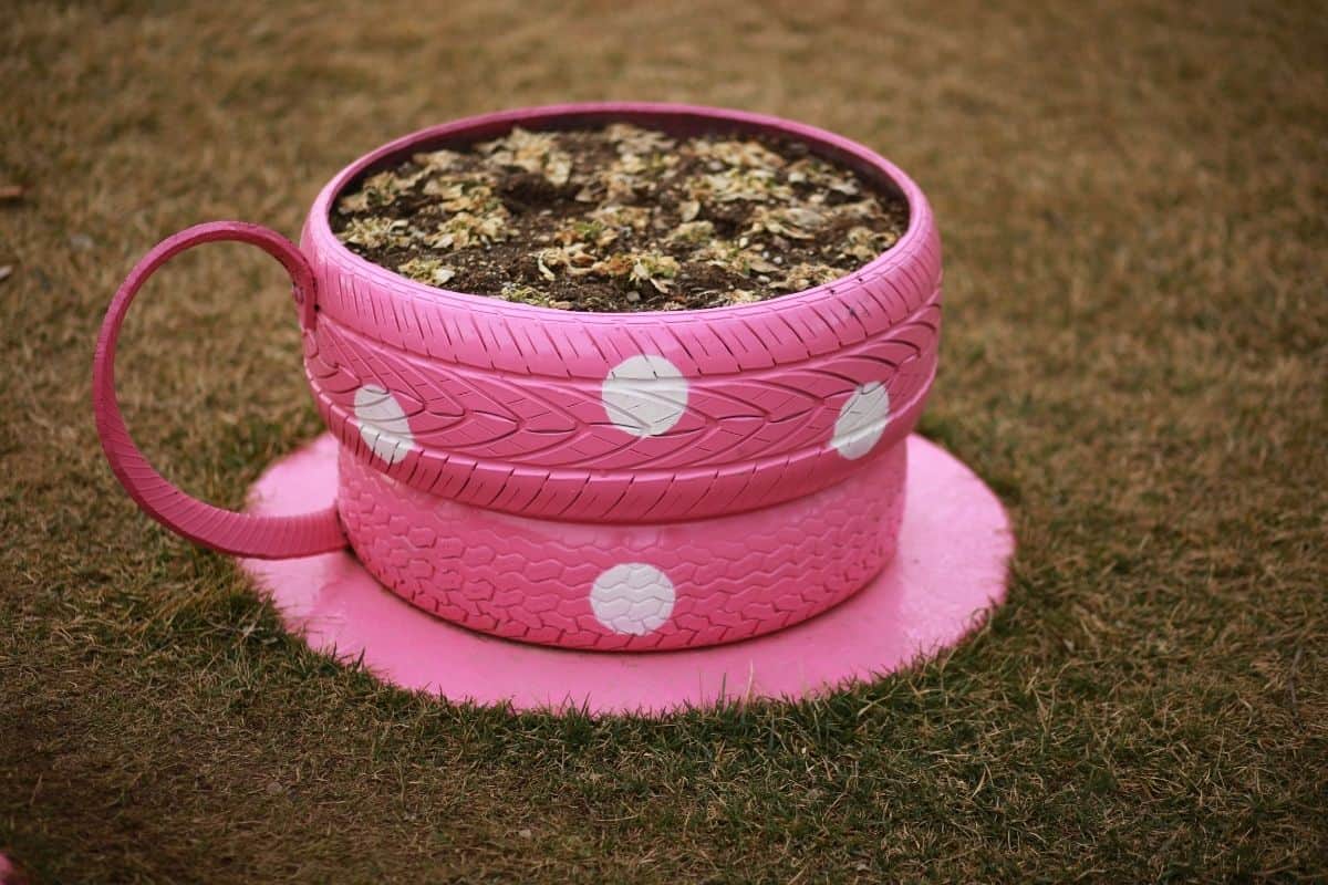 pink car tire planter