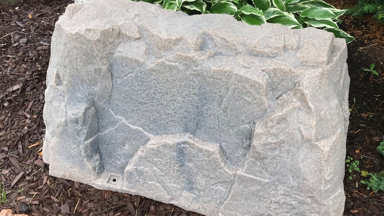 A fake rock cover