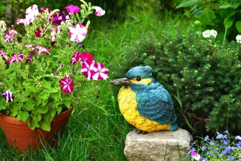 colorful bird sculpture in the garden