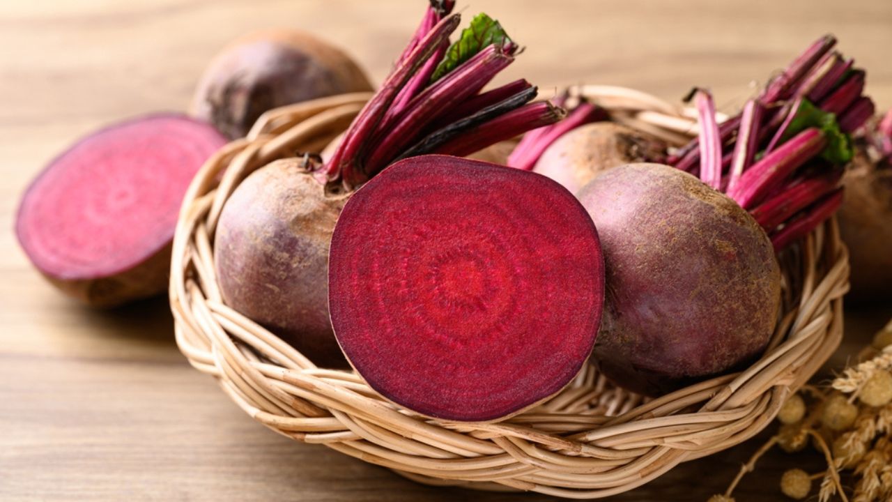 Fresh beetroot in natural basket on wooden background, Food ingredient