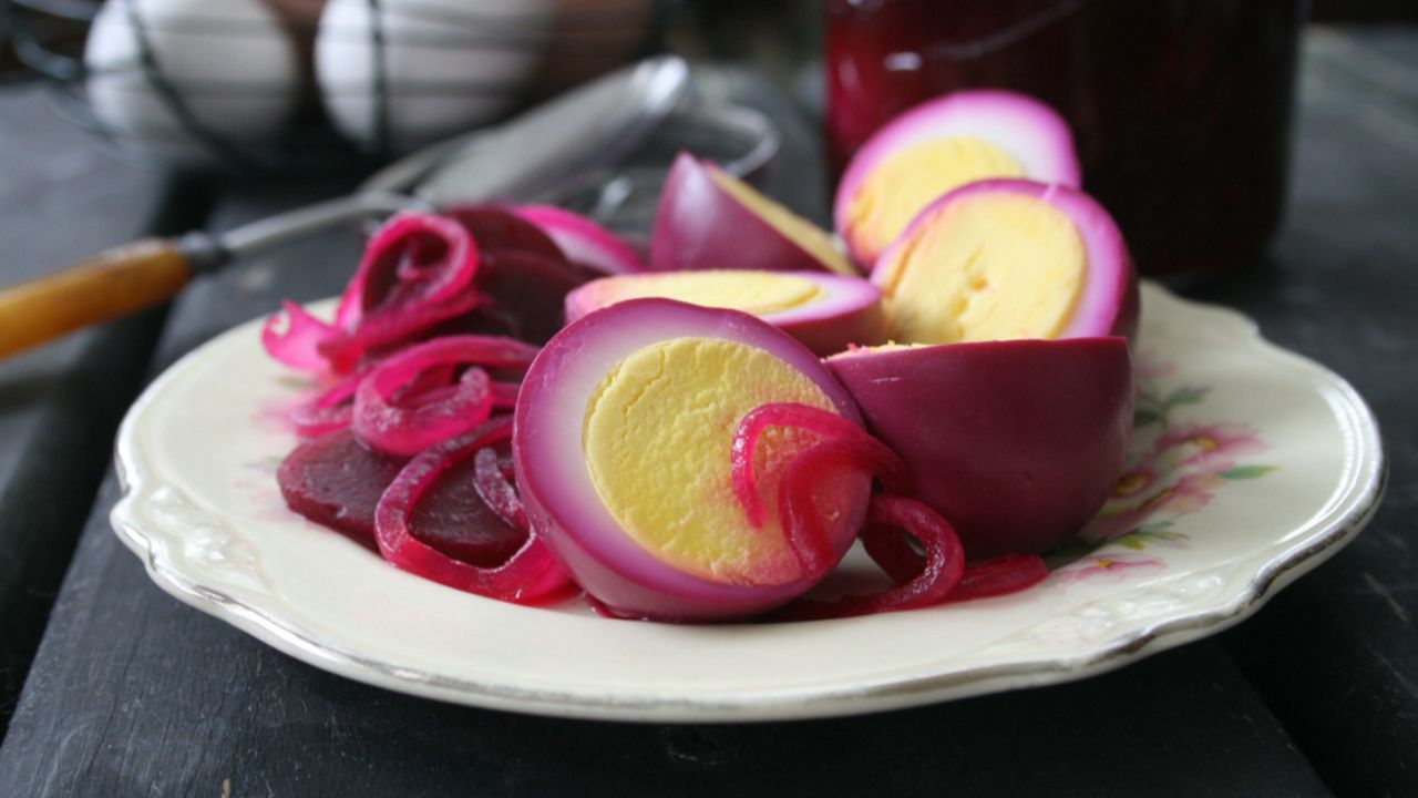 Pickled in Beet Juice Hard Boiled Eggs with Sliced Beets and Onions