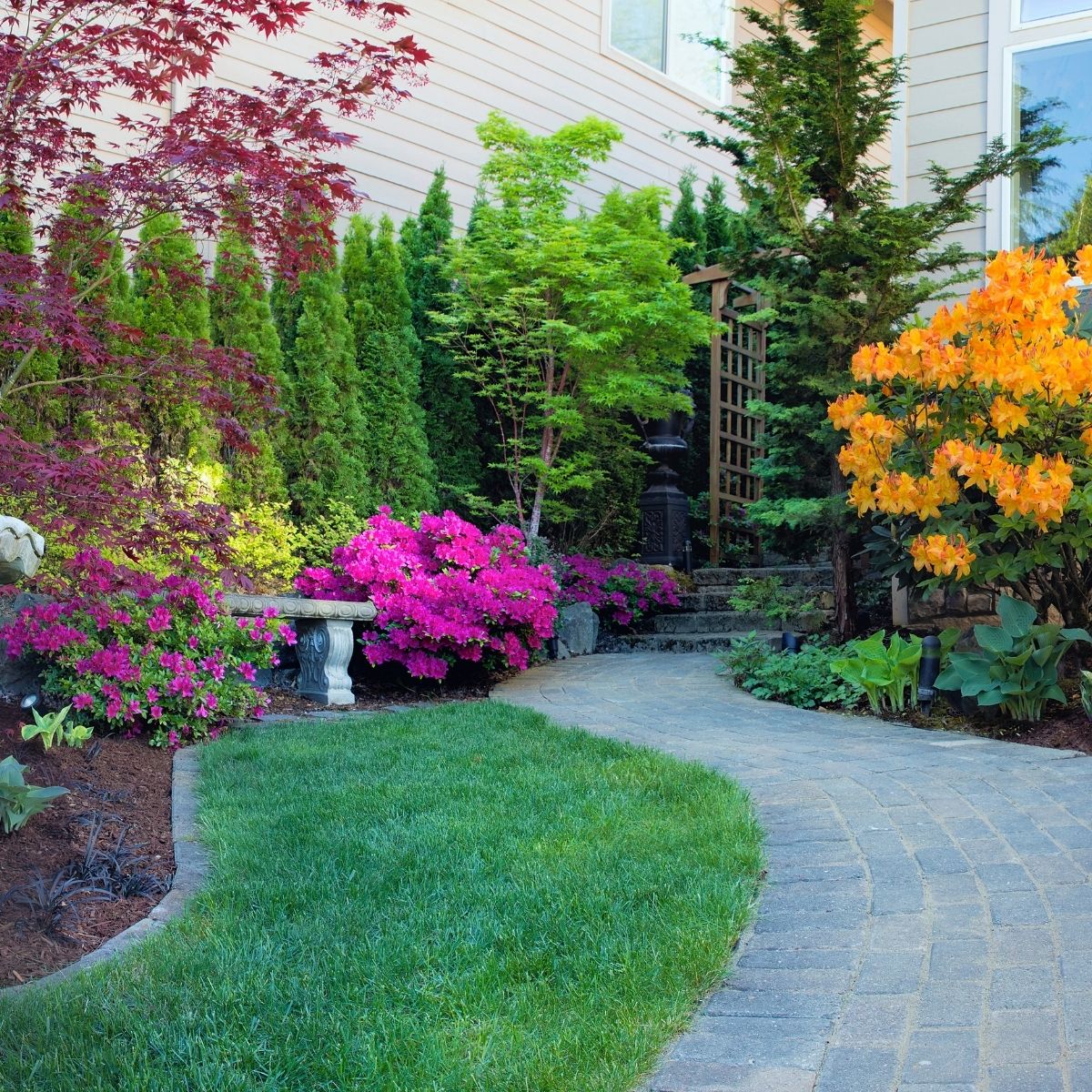 beautifully landscaped walkway to the house