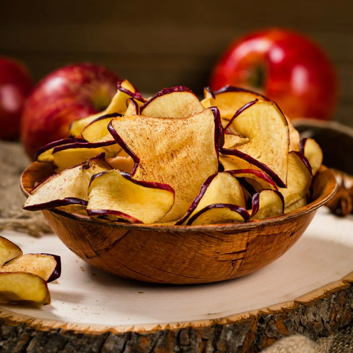 apple chips in a wooden bowl
