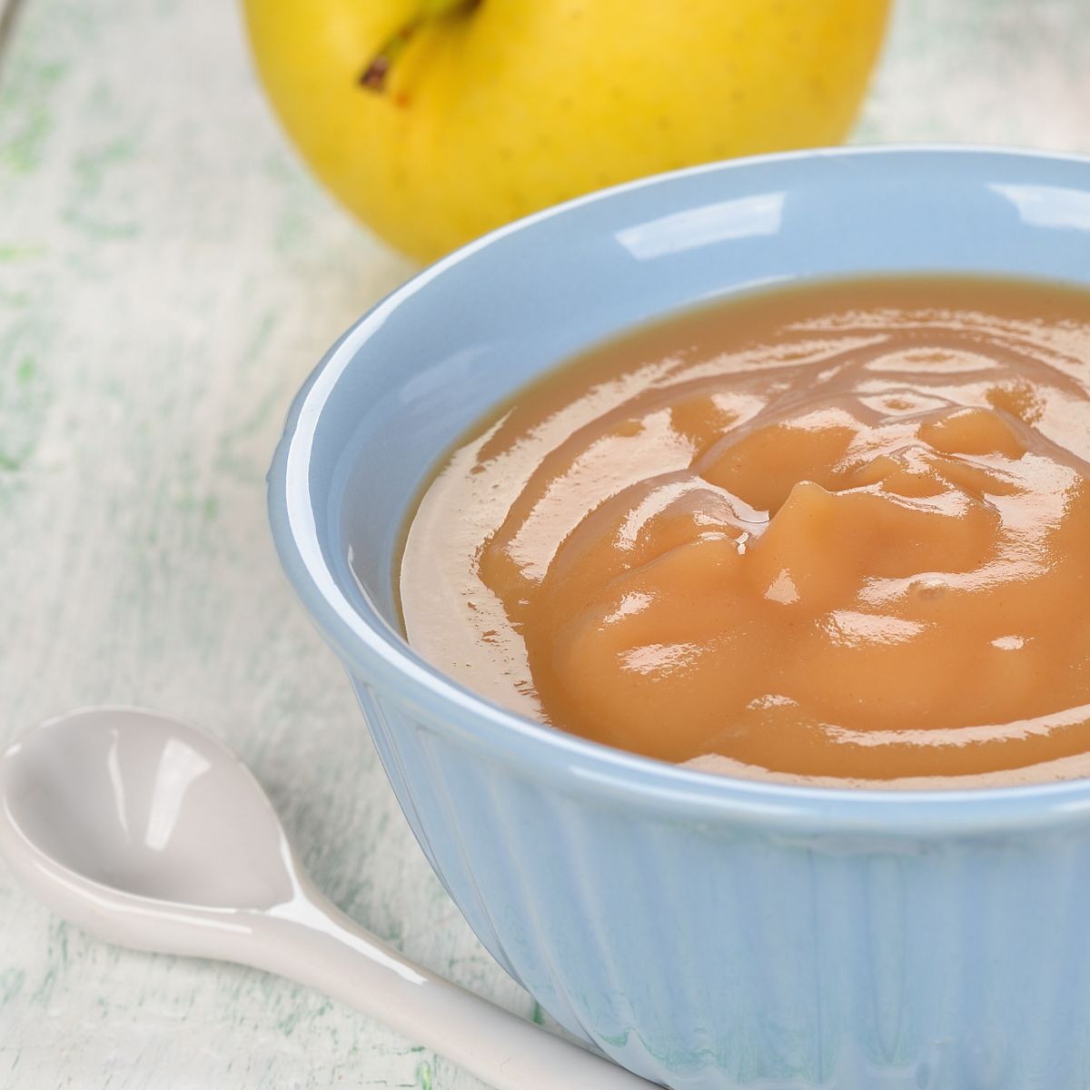 apple sauce in a light blue bowl