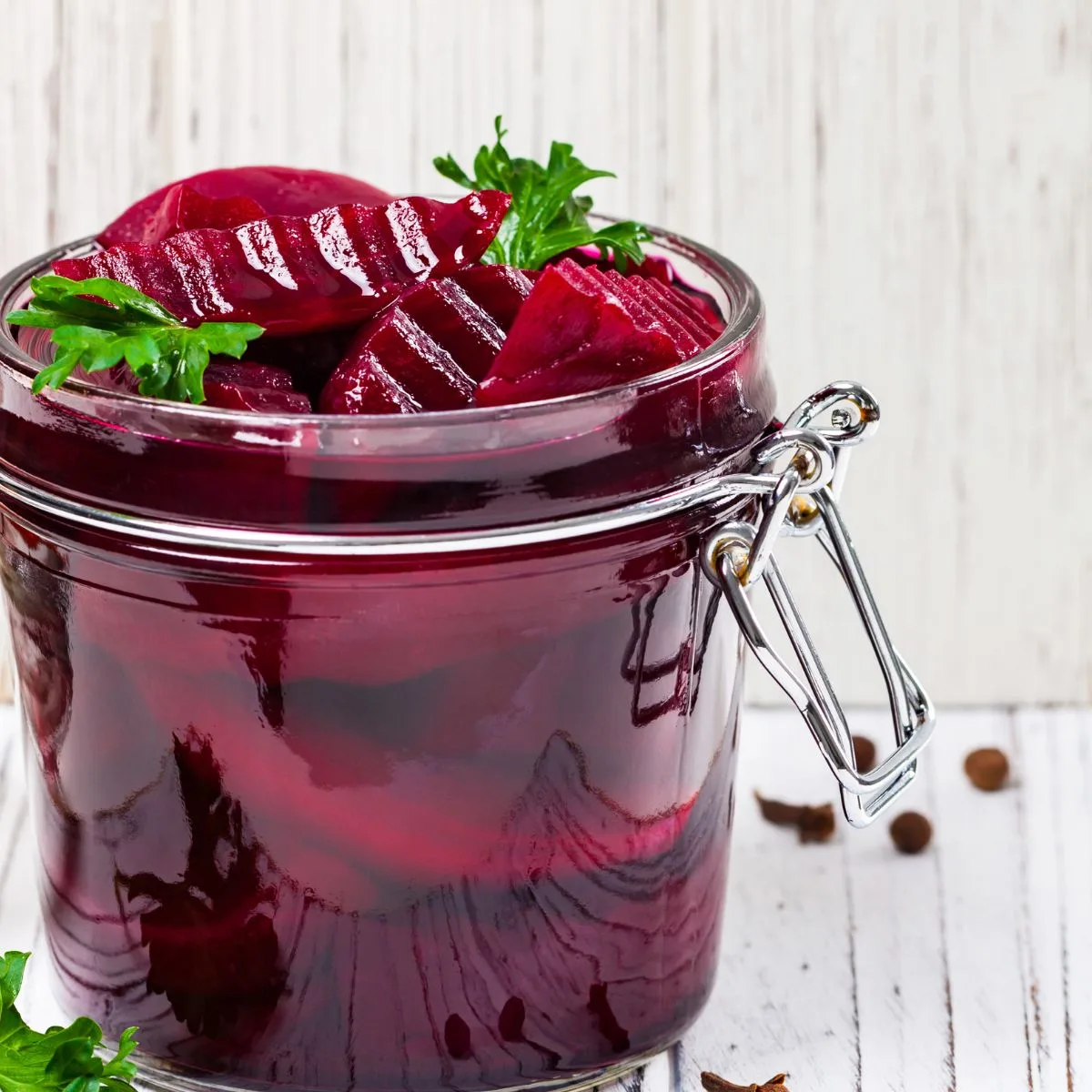 an open jar of beet pickles