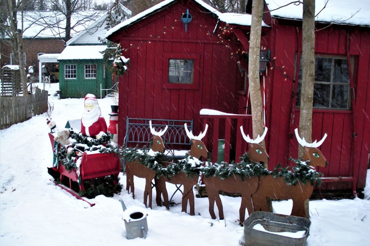 shed decorated as Santa's workshop