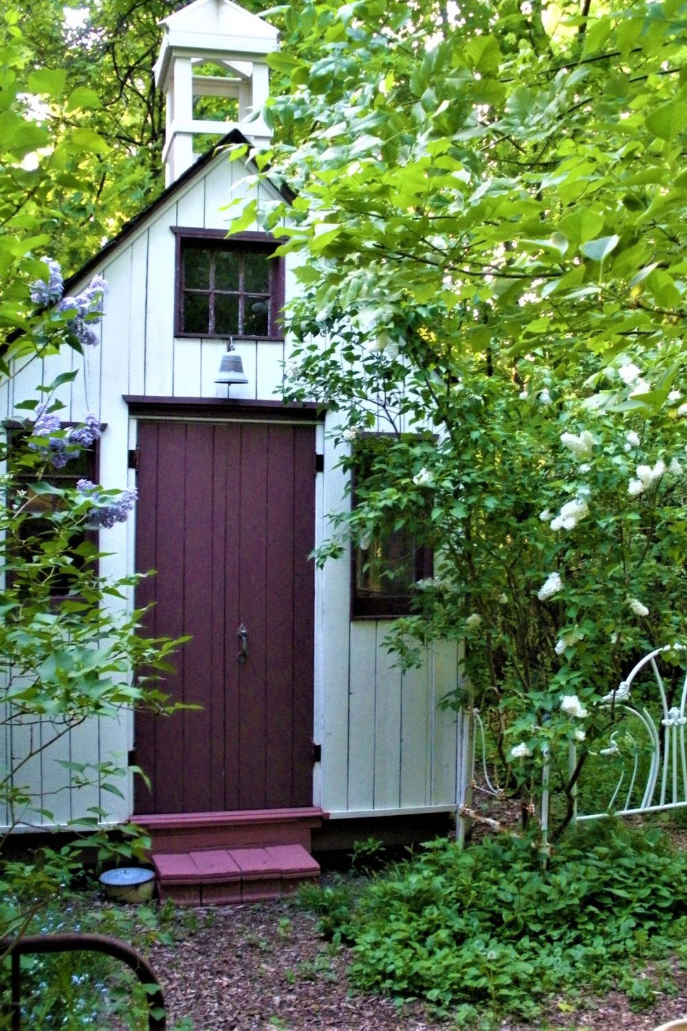 a small white church in the woods