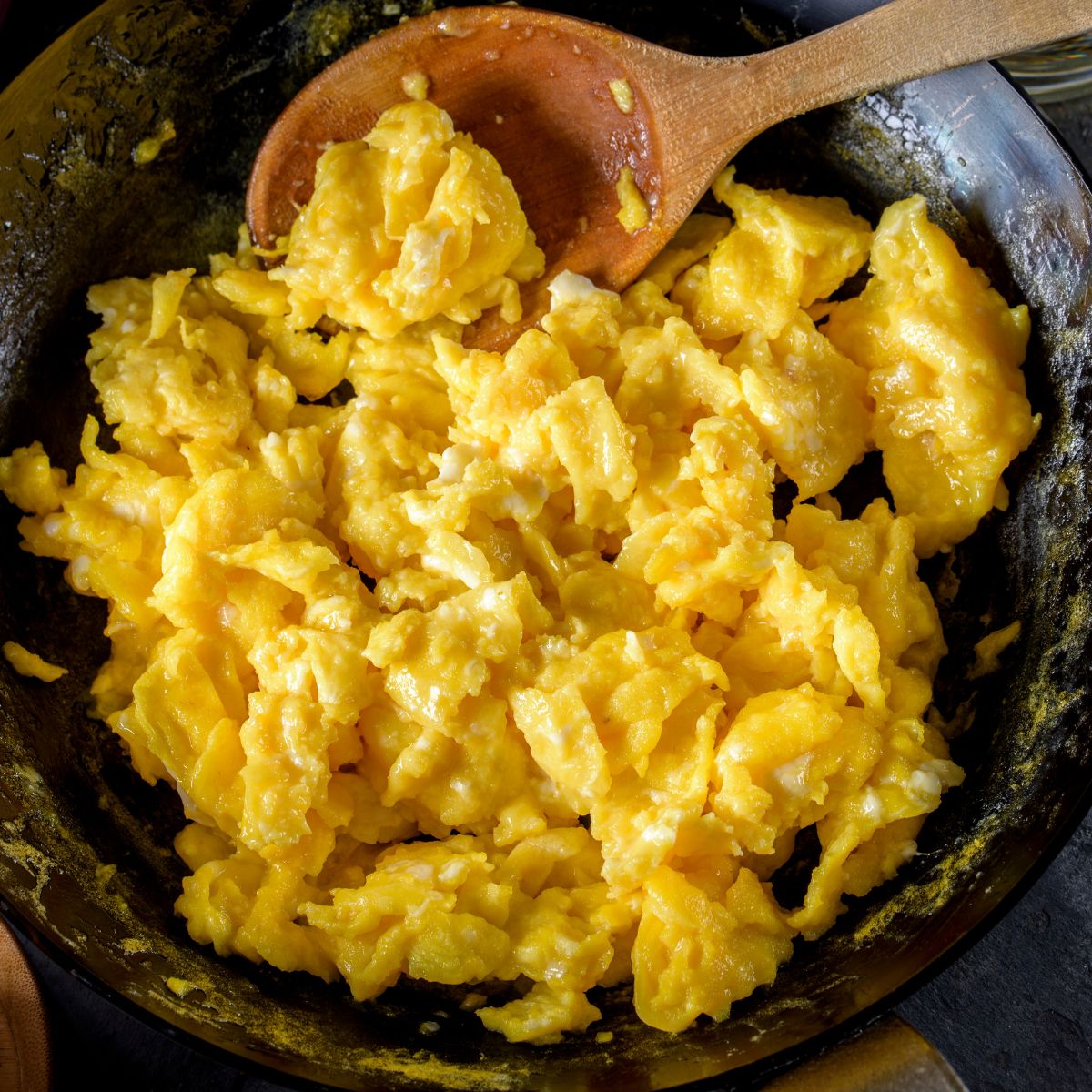 a pan of scrambled eggs