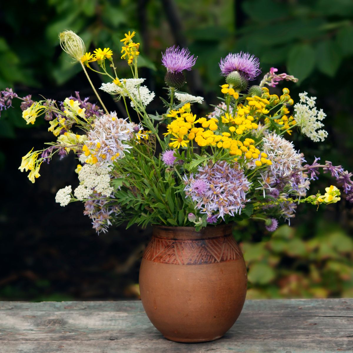 wildflower bouquet in a ceramic vase