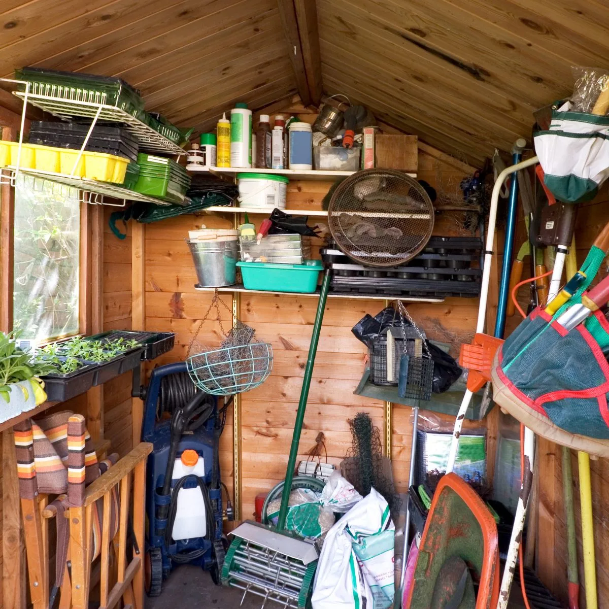 A cluttered storage shed.