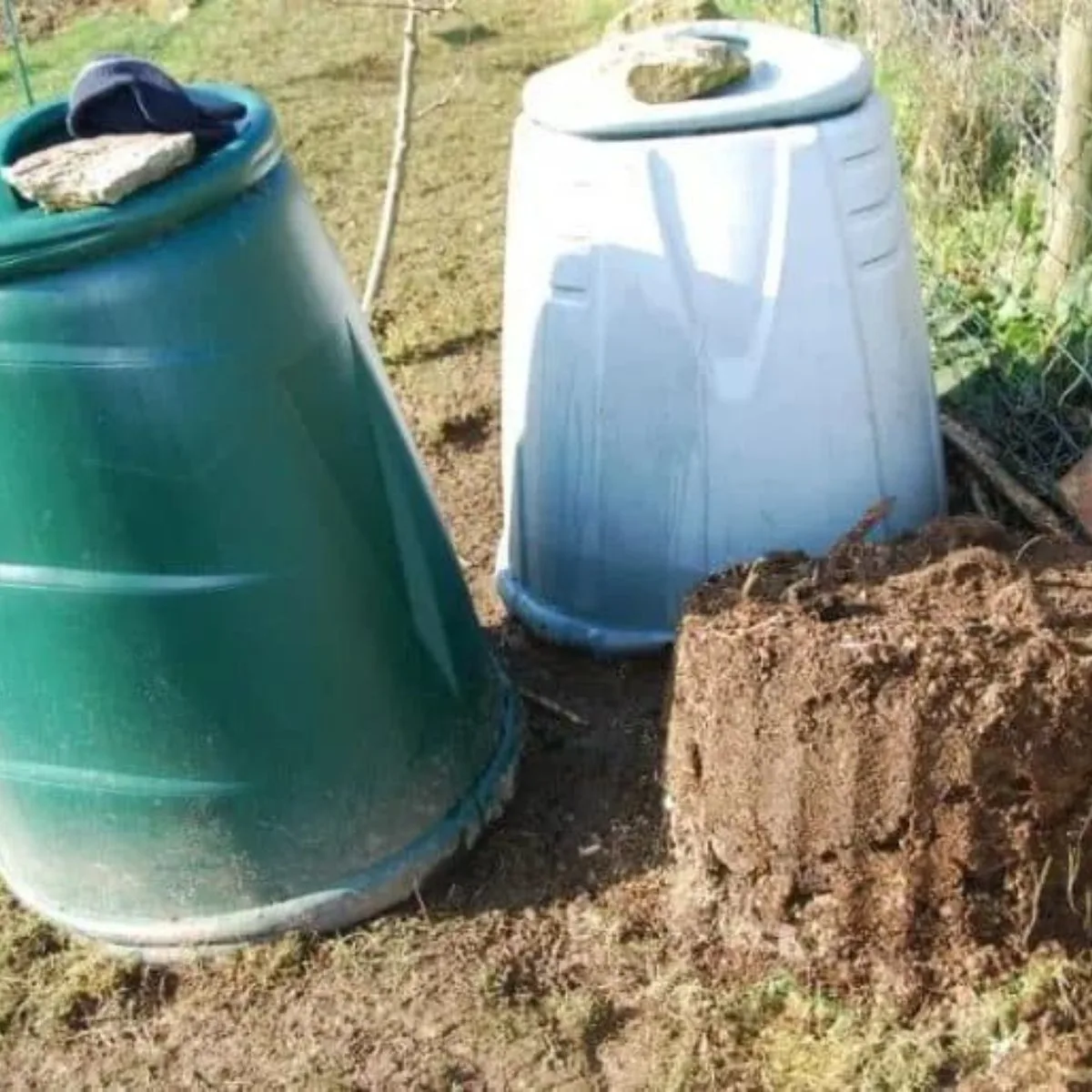 a couple of upside-down plastic bins used for cold composting. 