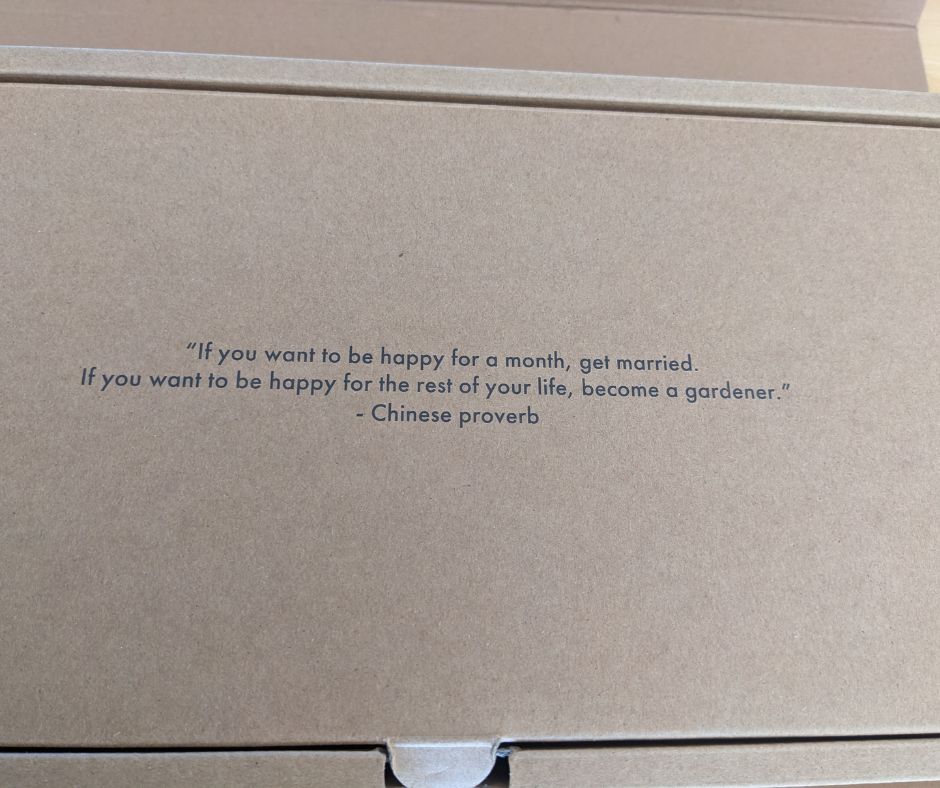 The smart garden box has a Chinese proverb written on it: "if you want to be happy for a month, get married; if you want to be happy for the rest of your life, become a gardener".