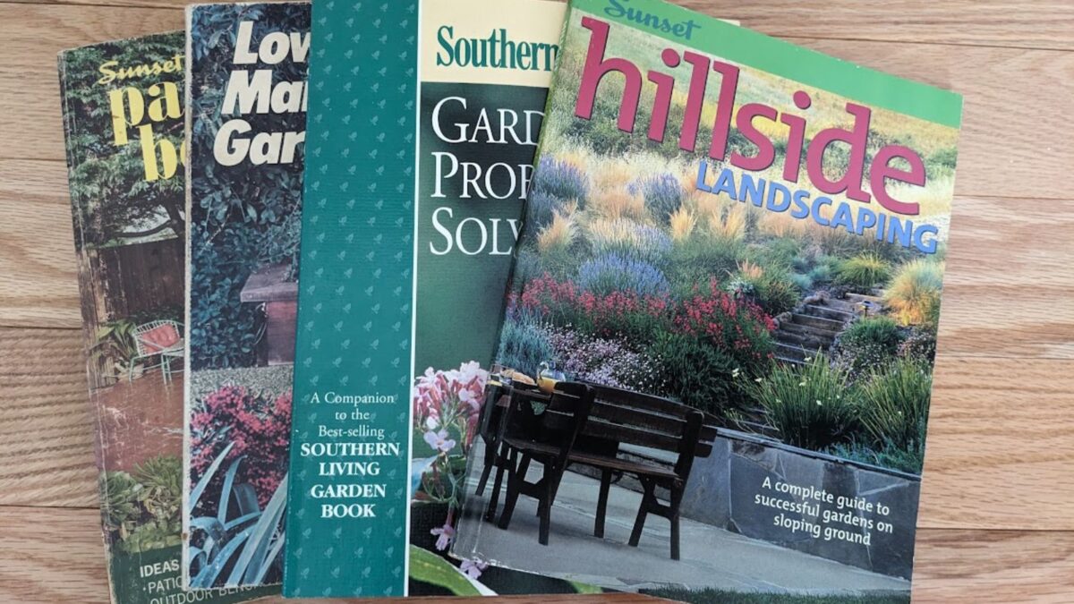a pile of gardening and landscaping books.