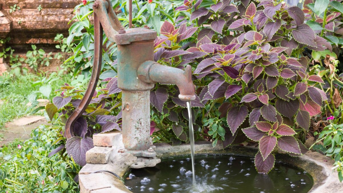 A water feature made from an old water pump.