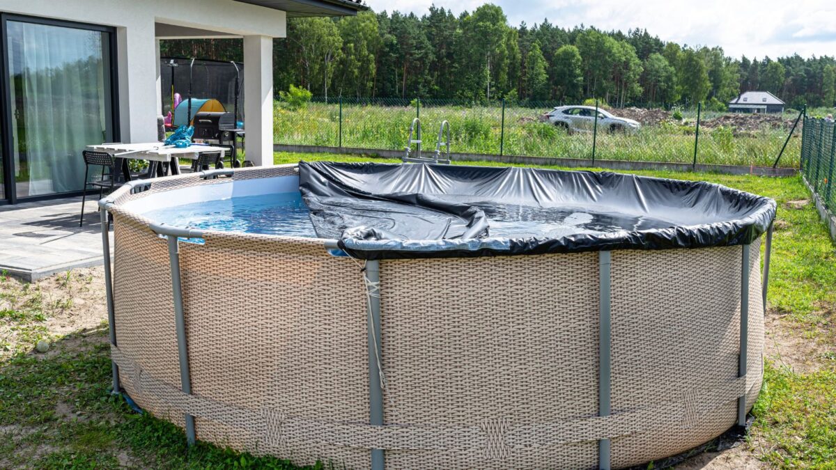 backyard pool by the house. 