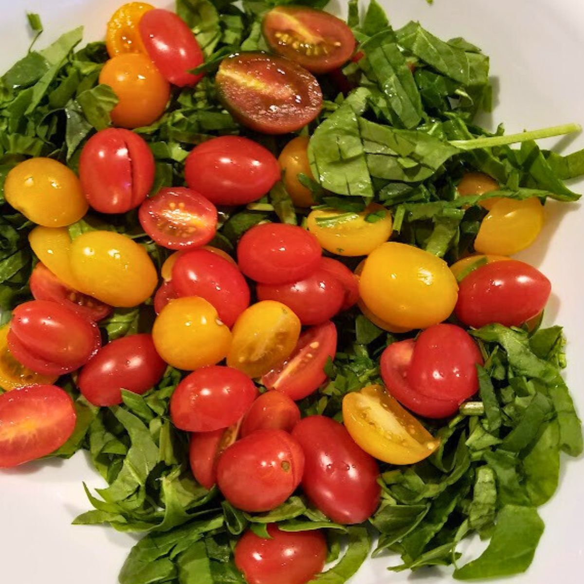 cherry tomatoes and spinach salad.