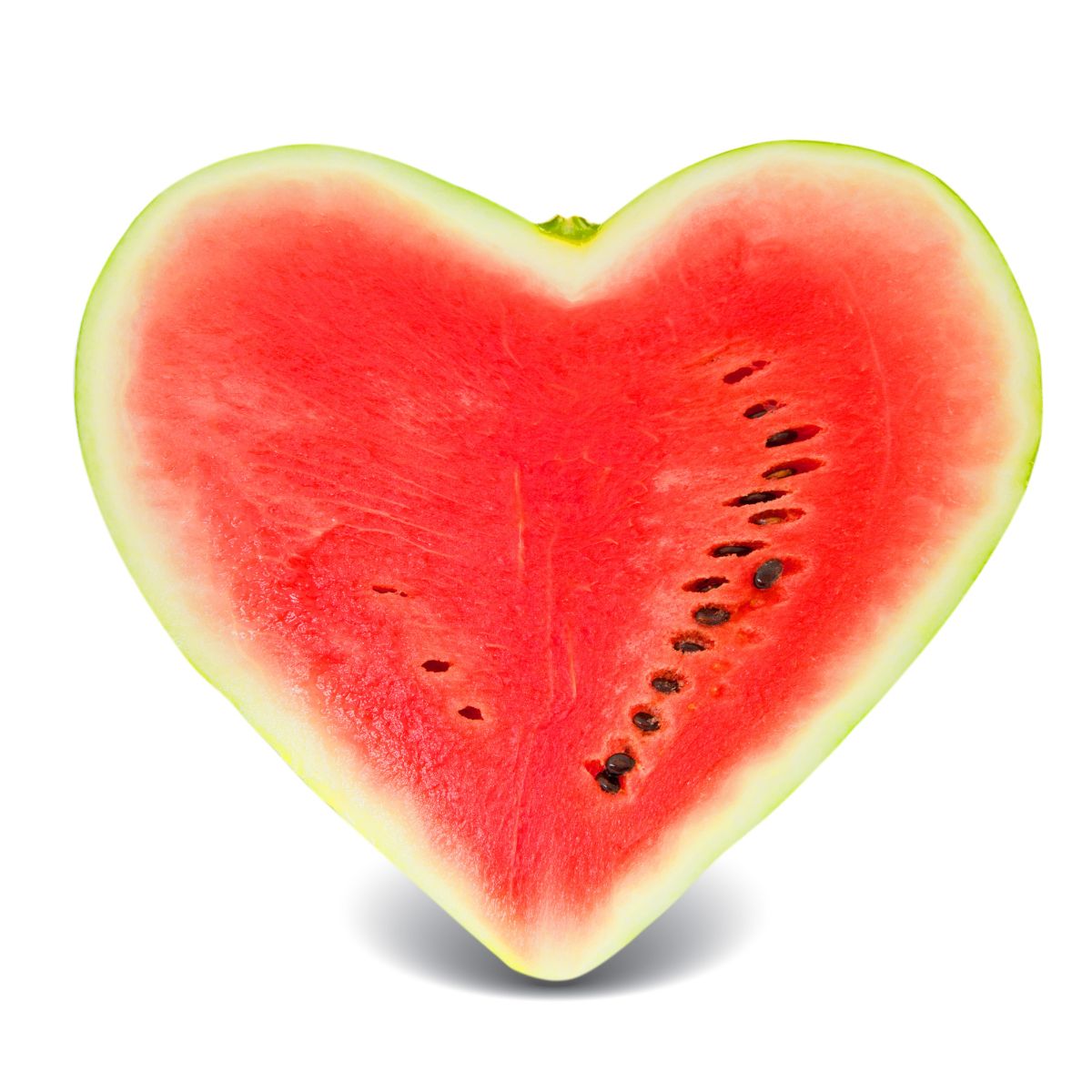 half of a heart shaped watermelon, on a white background.